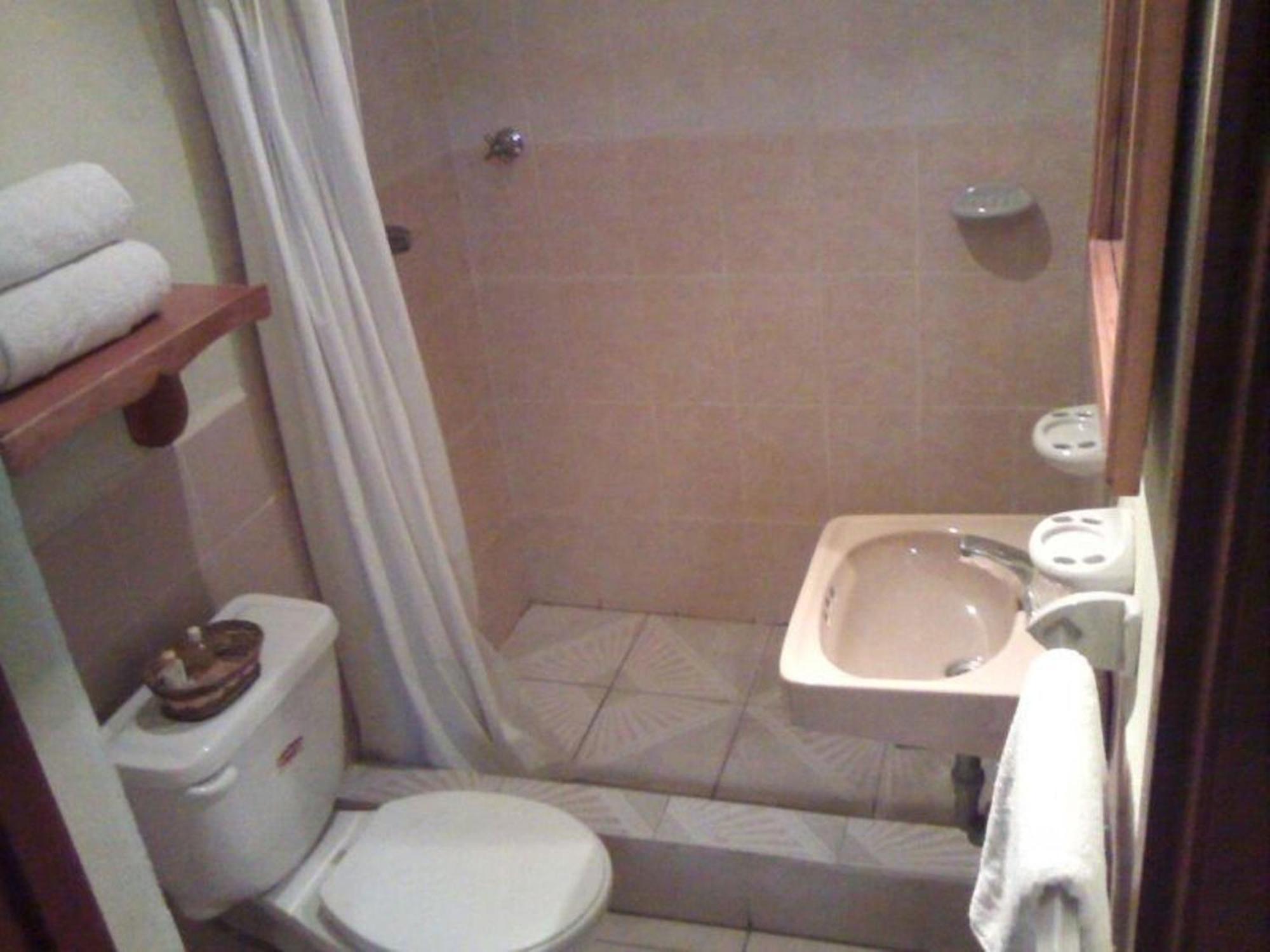 Nakum Hotel Flores Quarto foto